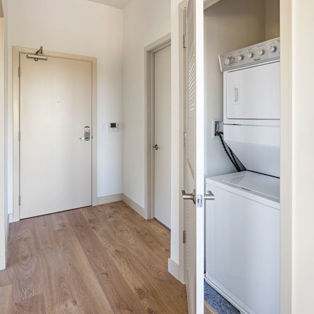 Fuse Cambridge Apartments - in-unit washer and dryer set in closet