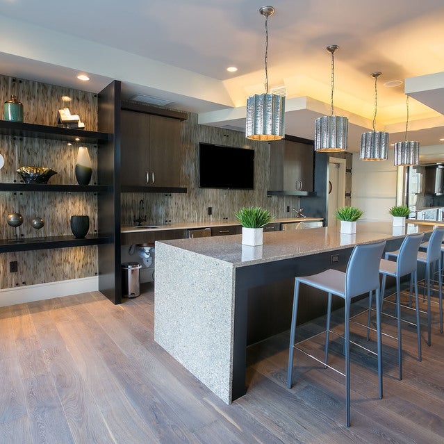 Fuse Cambridge Apartments - clubroom with tables, seating area, TV, and cloubroom kitchen